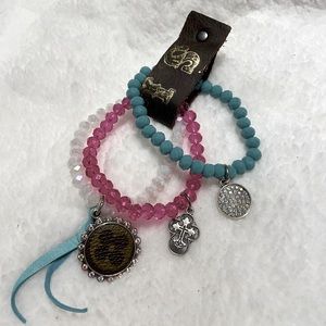 Beautiful pink, white and teal stretch bracelet w/charms. Set of 3. Never worn.